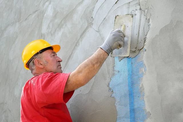 Zaprawa murarsko-tynkarska - kluczowe zastosowania i właściwości materiału Zaprawa murarsko-tynkarska - kluczowe zastosowania i właściwości materiału
